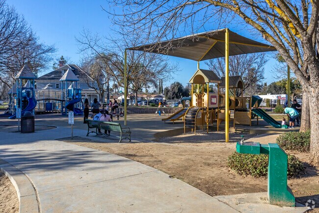Families love the playgrounds a replica landmarks at Trolley Creek Park in Fresno.