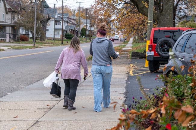 Southwest Canton residents take a stroll in the early morning.
