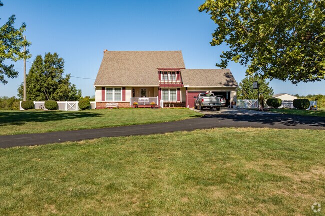 Ranch homes on large-acre lots are commonly tucked into the rolling hills of Little Blue.