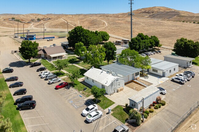 The Sunrise High School campus is located adjacent to Avenal High School.