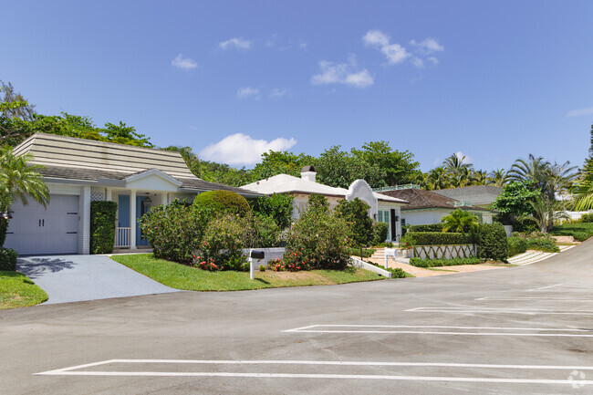 Charming high end coastal homes lining the peaceful streets of the Gulf Stream neighborhood