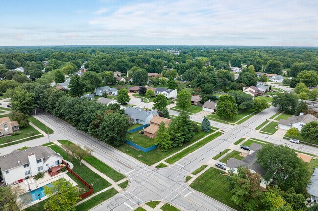 The homes in Koke Mill sit on tree lined streets.