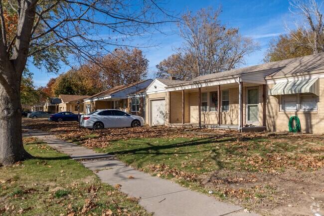 Most homes in East Mt Vernon are surrounded by tall trees.