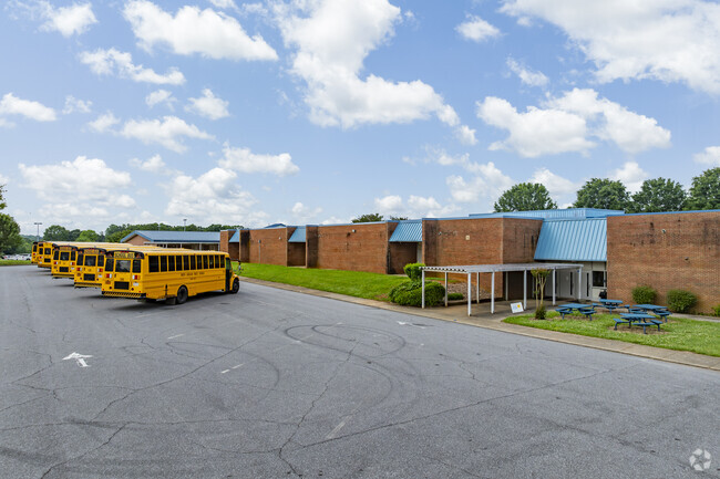 Many students of Charles H. Tuttle Middle School use the school's bus system.