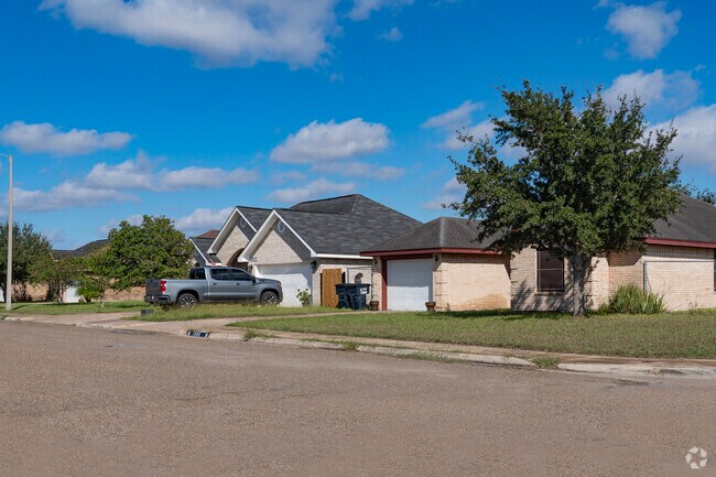 Row of beige brick style homes located in La Villa.