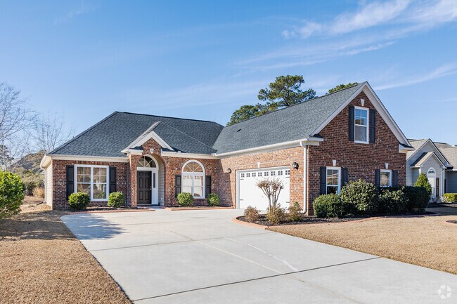 Murrells Inlet has beautiful brick traditional styles of homes with two-car garages.