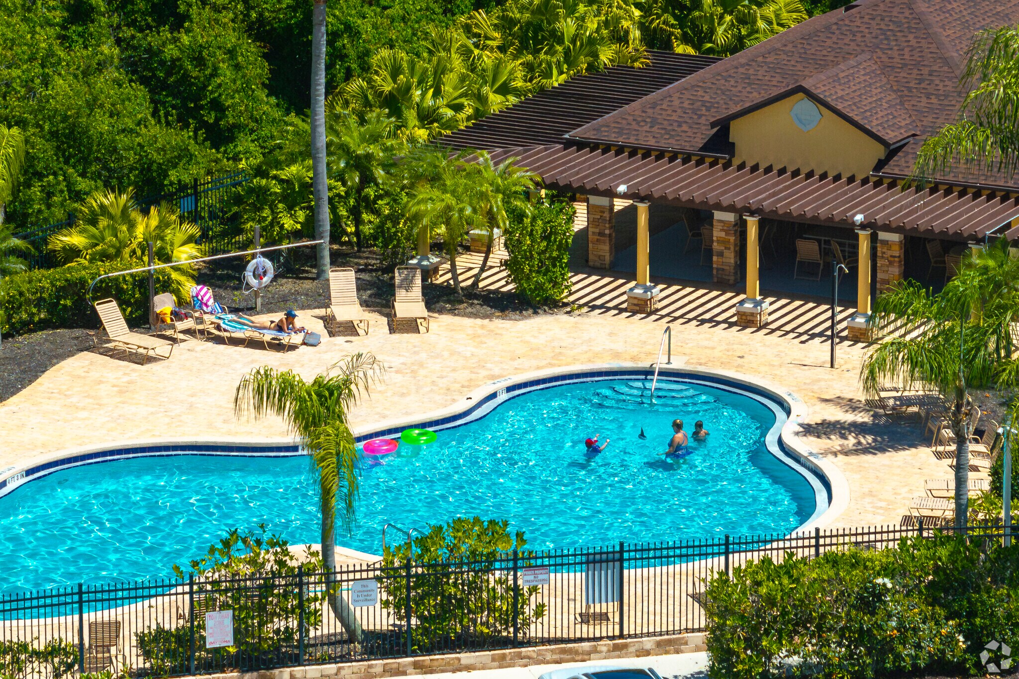Residents of Tuscany Woods can cool off in the neighborhood pool or relax at the clubhouse.
