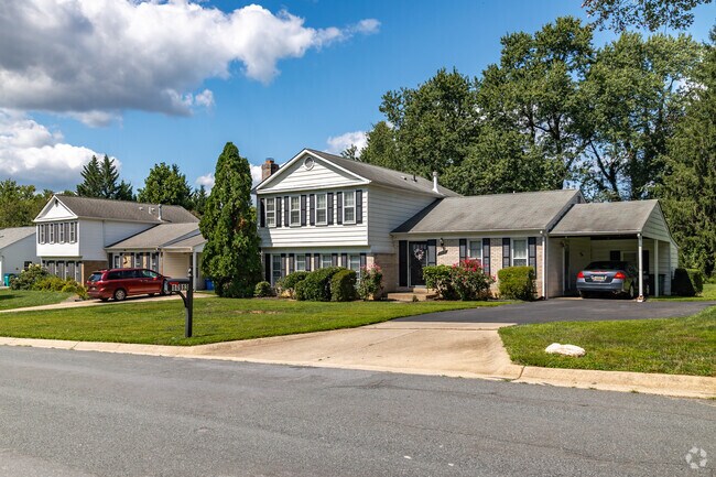 A charming row of spacious split-level homes on a quiet street in Flower Valley.