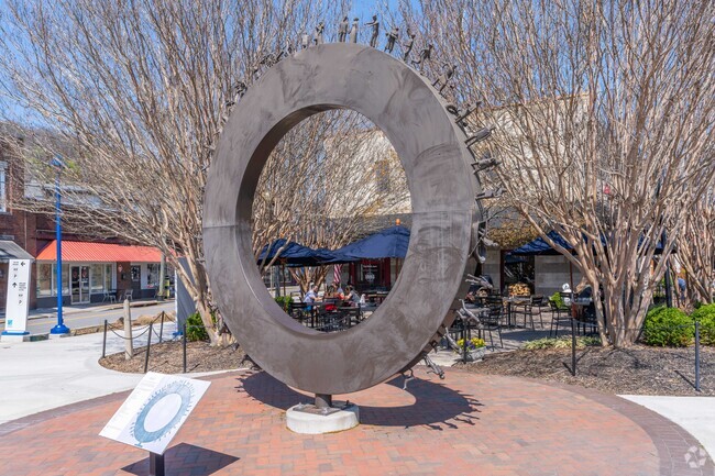 Patrons of 1885 Grill get to enjoy local art while dining on the patio in Piney Woods.