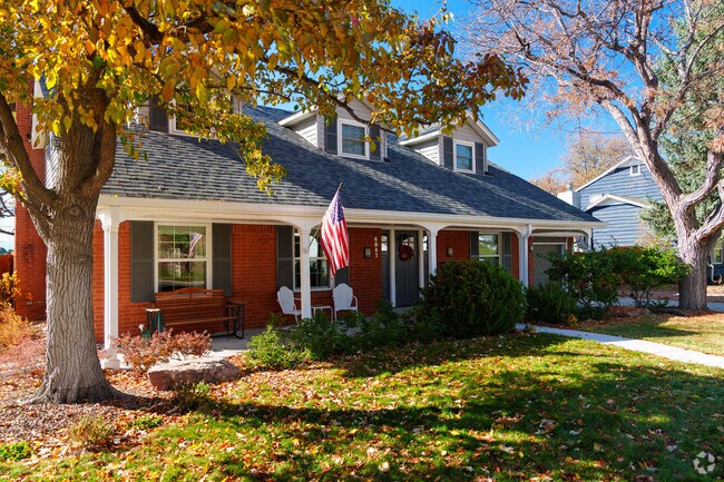 Some colonial homes in Cherry Knolls have large front porches.