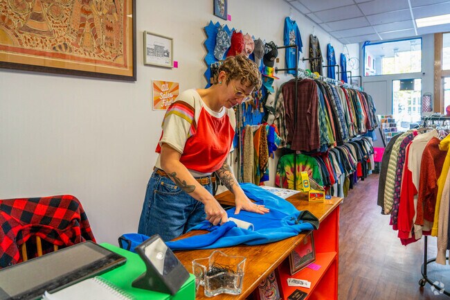 The owner of Slowpoke Exchange, near Graniteville, gets dust off a new shirt.