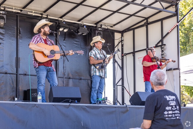 Attendees enjoy live music during the Pumpkin Daze Fall Festival.