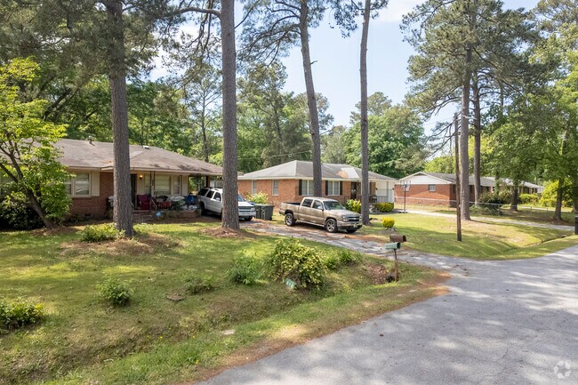 Mature pines and lush foliage bring a welcoming feel to Greenview in Columbia.