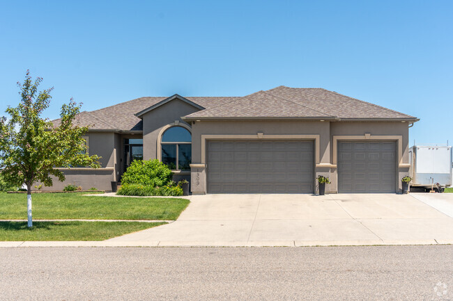 A modern single-family home in Burlington offers spacious living and contemporary design.