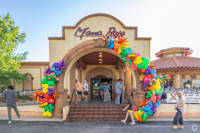 The colorful ballon arch creates a fun photo spot at Cinco de Mayo at Mama Roja.
