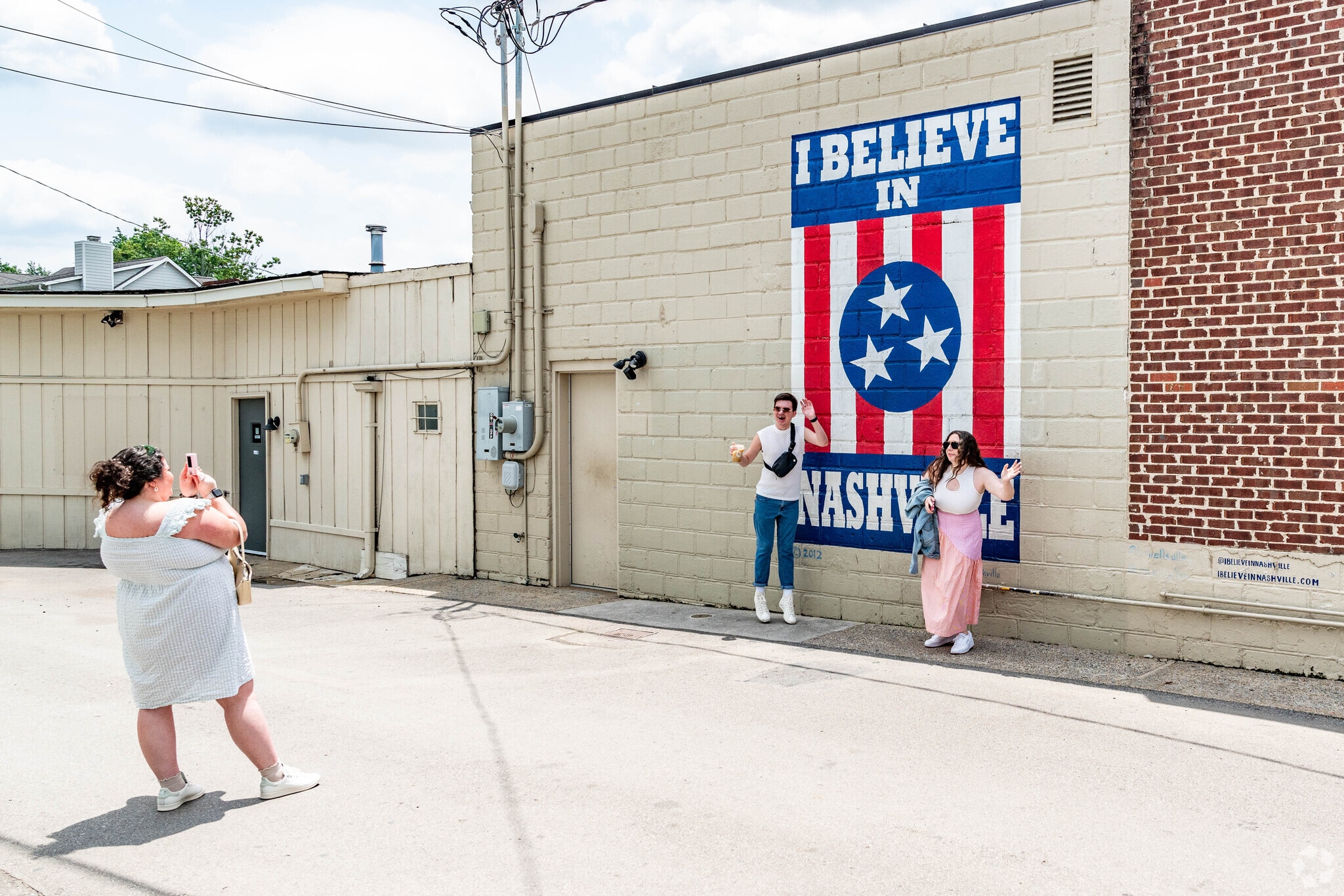 People like to pose for a photo in front of the I Believe in Nashville Mural in 12 South.