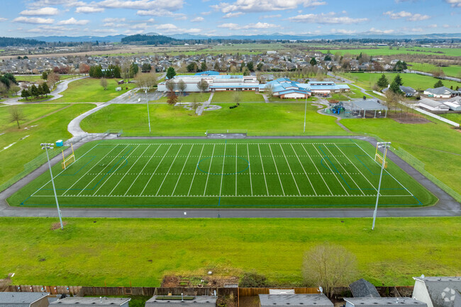 Meadow View School has a football field for students to play on in Eugene.