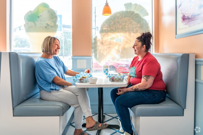 Presidents residents cool off with a tasty treat at Lic's Deli and Ice Cream shop.