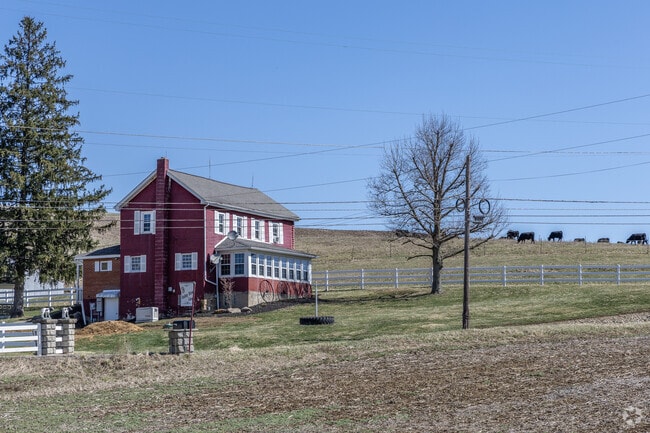 Large farmhouses serve as a resting place for hard working cattle farmers in Hopewell Township.