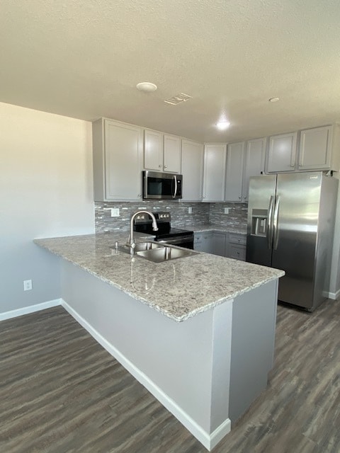 beautifully appointed kitchen with top of the line frigidaire appliances, granite countertops