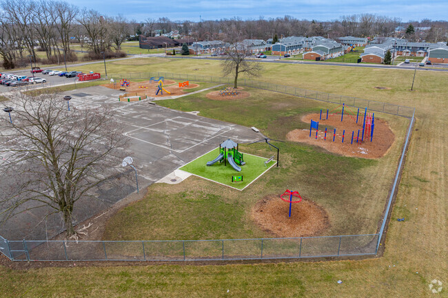 Students at Adams Elementary School have a large playground to run around on.