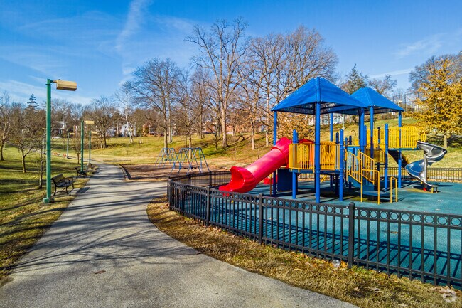 Children love to play on the large, fenced-in playground at Langdon Park in Langdon.