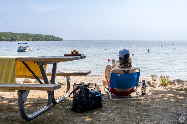 Public beach access is easily accessible in Omena.