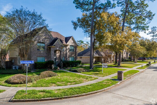 A row of two story homes sit along a quiet cul-de-sac road in Baytown.