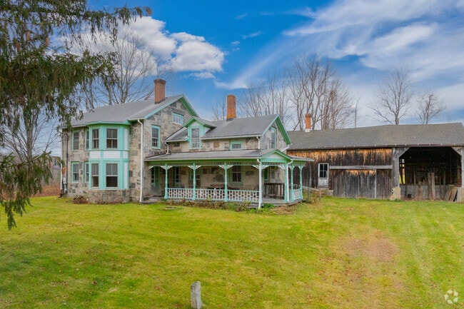 Historic homes in New Preston feature inviting front porches.