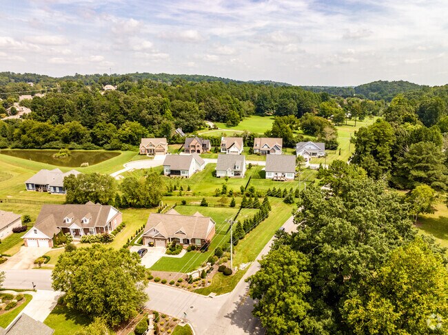 An aerial view on the Apison neighborhood and surrounding mountains.