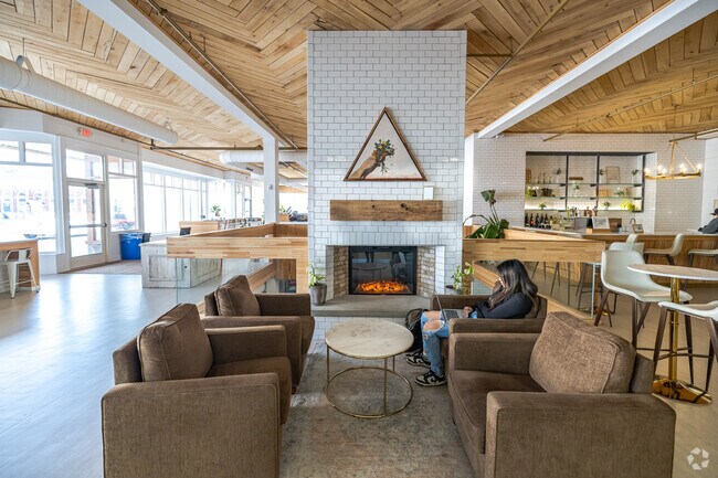 Sip warm coffee by the cozy fire in the architecturally stunning Boxed and Burlap in Delavan.