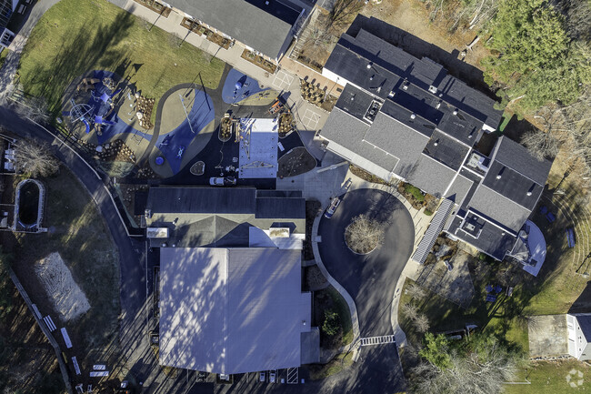 An aerial top-down view of the Charles River School in Dover, MA.