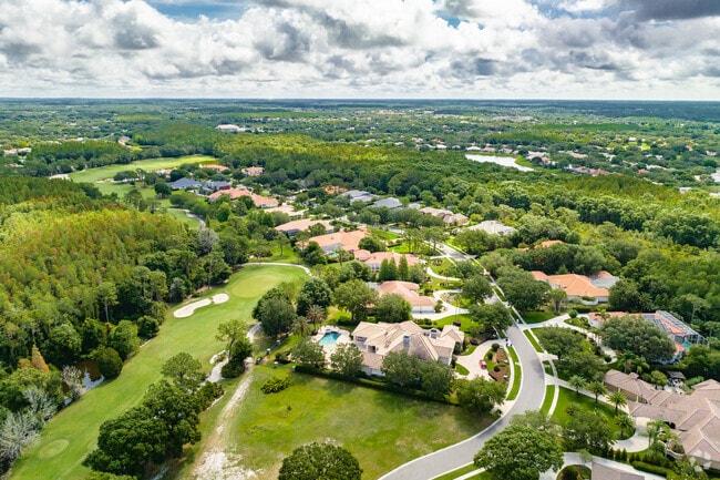Homes in Hunters Green are mixed in with nature ares as well as lakes.