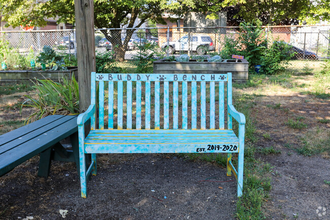 Washington Elementary School's buddy bench sits within the school's garden.