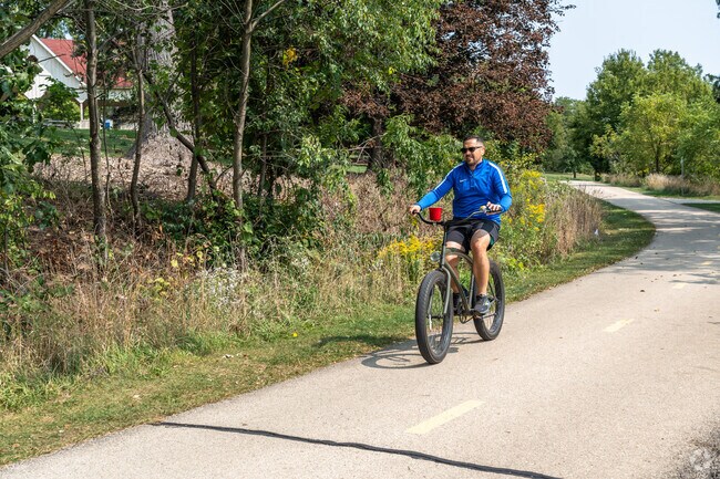 Farmington residents enjoy scenic bike rides through Du Page River Park.