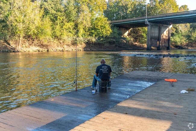 Fisherman of Dixie Heights fish from the docks along the Flint River.
