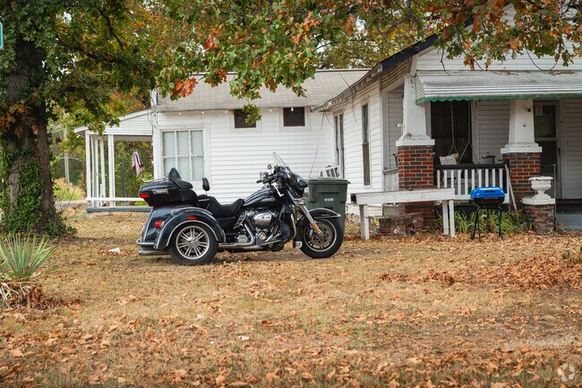 A Curtis Street resident enjoys the open air during motorcycle rides.