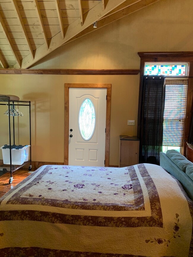 Sleeping area with queen bed
