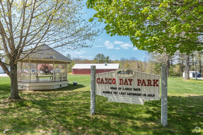 Photo of the Casco Day Park sign and gazebo in Casco, Maine.