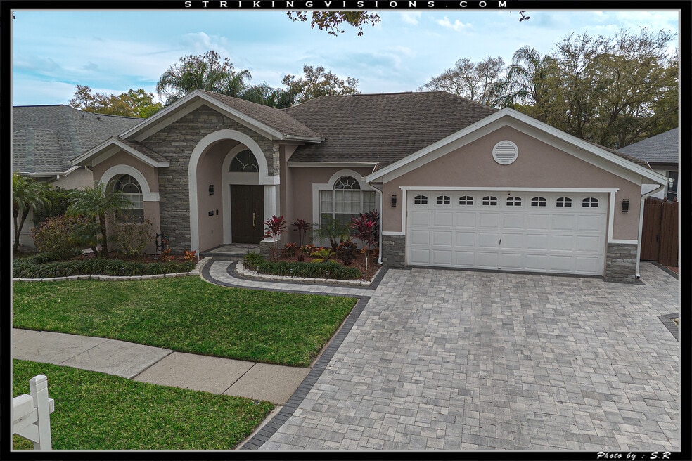 3704 Cypress Meadows Rd, Tampa, FL 33624 - photo 1
