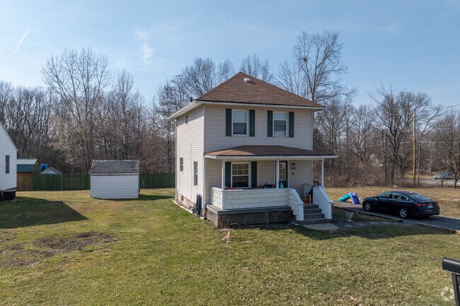 Two-story farmhouses are found throughout the Hilltop neighborhood.