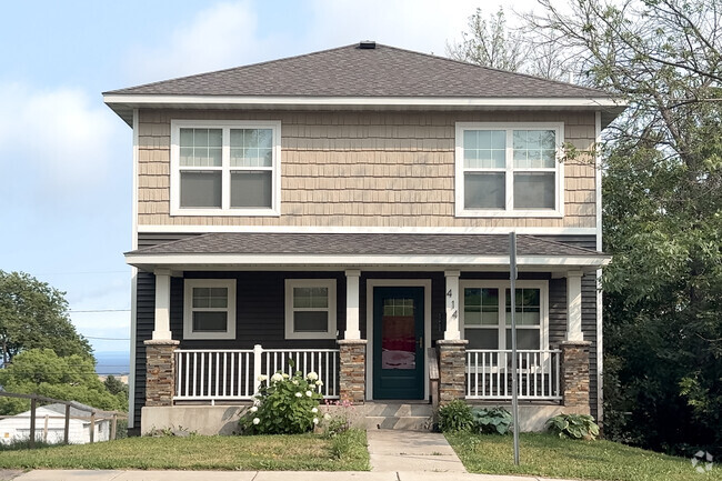 Long porches make use of the bigger footprint homes in Central Hillside Minnesota.