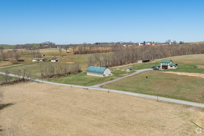 Farmhouses sit far off the main roads with hundreds of acres of land in Hopewell Township.