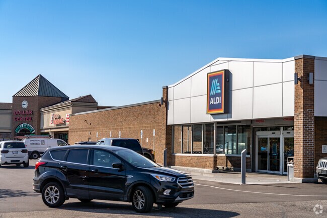 Shop for groceries at Aldi on the corner of 8 Mile Road in Mohican Regent.