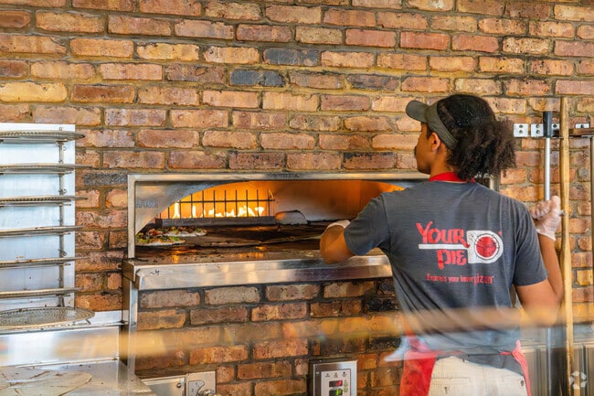 Locals enjoy the fresh ingredients at Your Pie near the Suburban Acres neighborhood.
