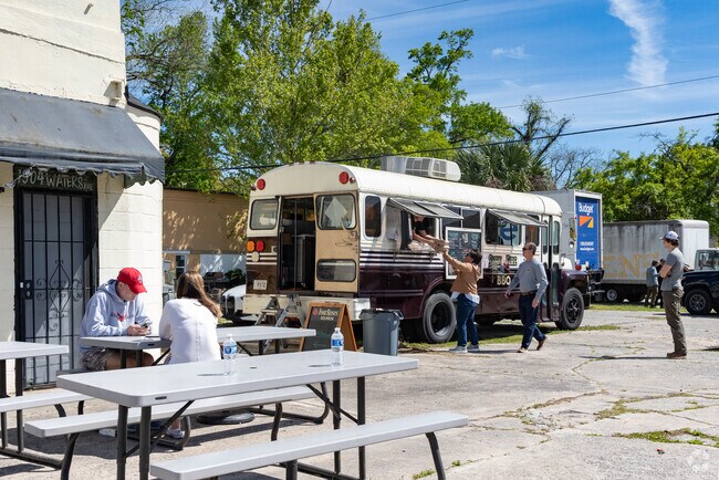 Live Oak residents enjoy food trucks on the weekend along Waters Avenue.