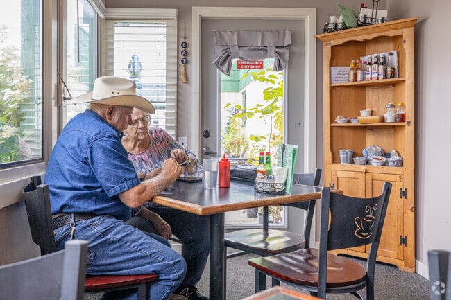 Locals sit and wait for their food at Hansgrill Hansville Grocery and Provisions Co.