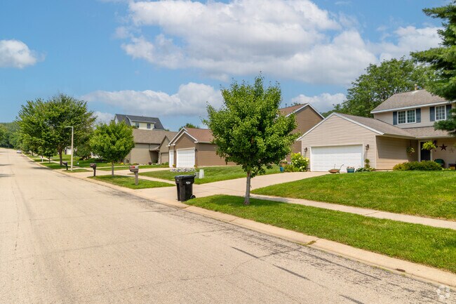Driveways lead to two-car garages for single family homes in Baihly Meadows.