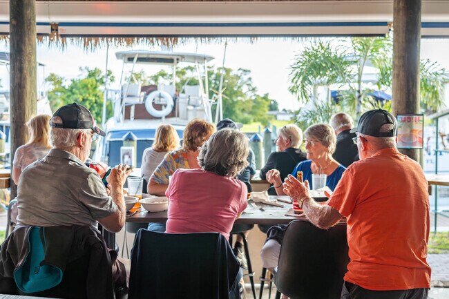 Many residents of Lochmoor Waterway Estates take their boats to dinner, parking at the restaurant docks.