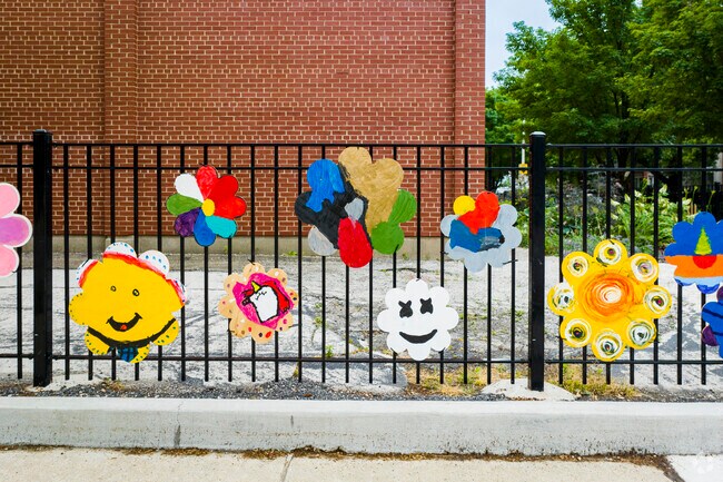 Students decorate the fences at Mitchel Elementary School.